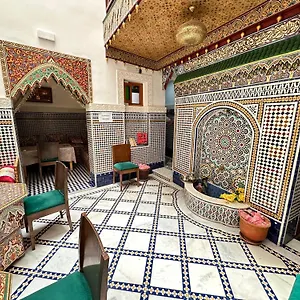 Shama Riad